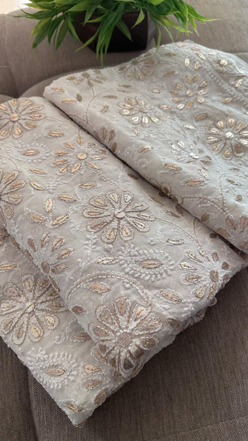 Ivory handcrafted Chikankari and Mukaish premium Georgette unstitched suit with Gotapatti detailing by LVW Fashion Luxurious Chikankari.