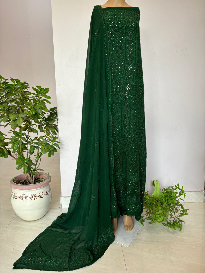 Green premium georgette unstitched suit with intricate Chikankari embroidery by LVW Fashion, showcasing elegant fabric and detailed craftsmanship.