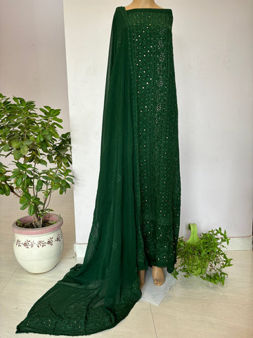 Green premium georgette unstitched suit with intricate Chikankari embroidery by LVW Fashion, showcasing elegant fabric and detailed craftsmanship.