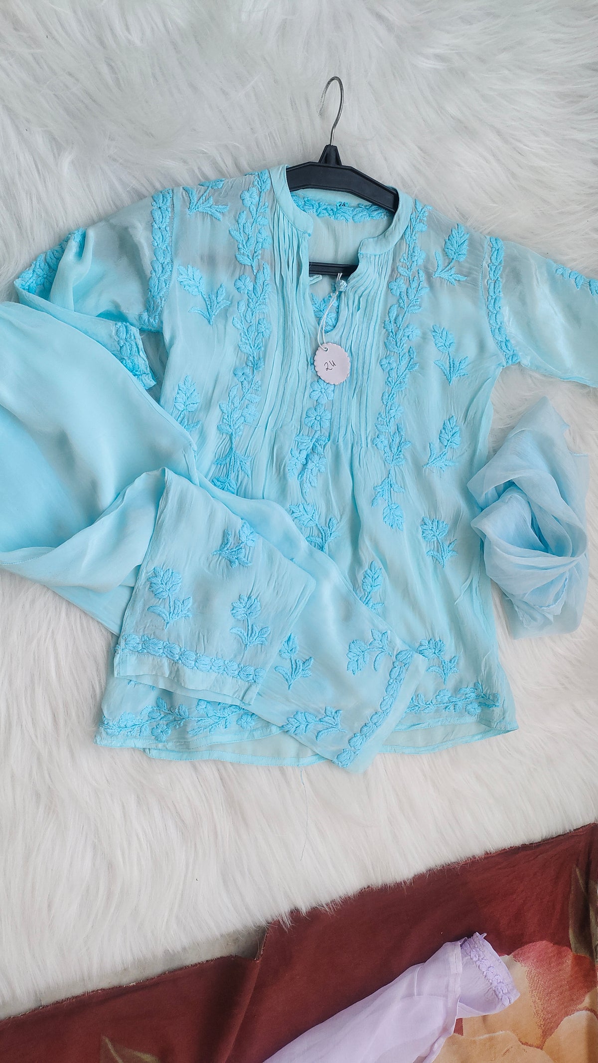 Handmade Lucknow Chikankari kurta for baby girl by LVW Fashions, showcasing intricate embroidery and a luxurious look.