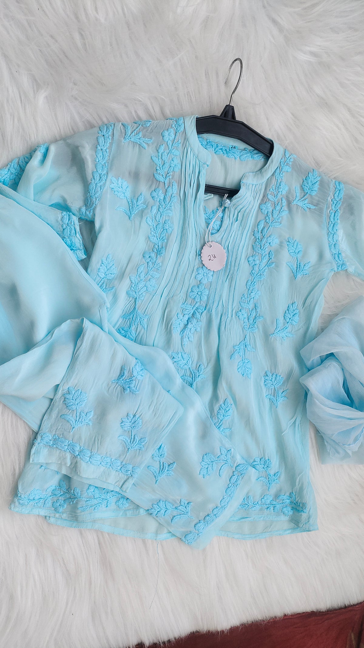 Handmade Lucknow Chikankari kurta for baby girl by LVW Fashions, featuring intricate embroidery and a luxurious look.