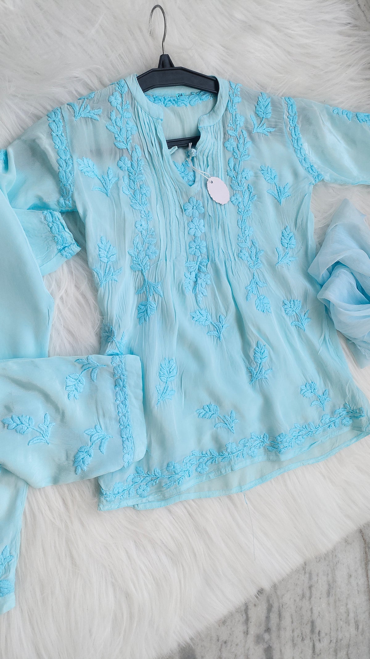 Luxurious handmade Chikankari kurta for baby girl, by LVW Fashions, featuring intricate Lucknow Chikankari embroidery for ages 6-12 months.