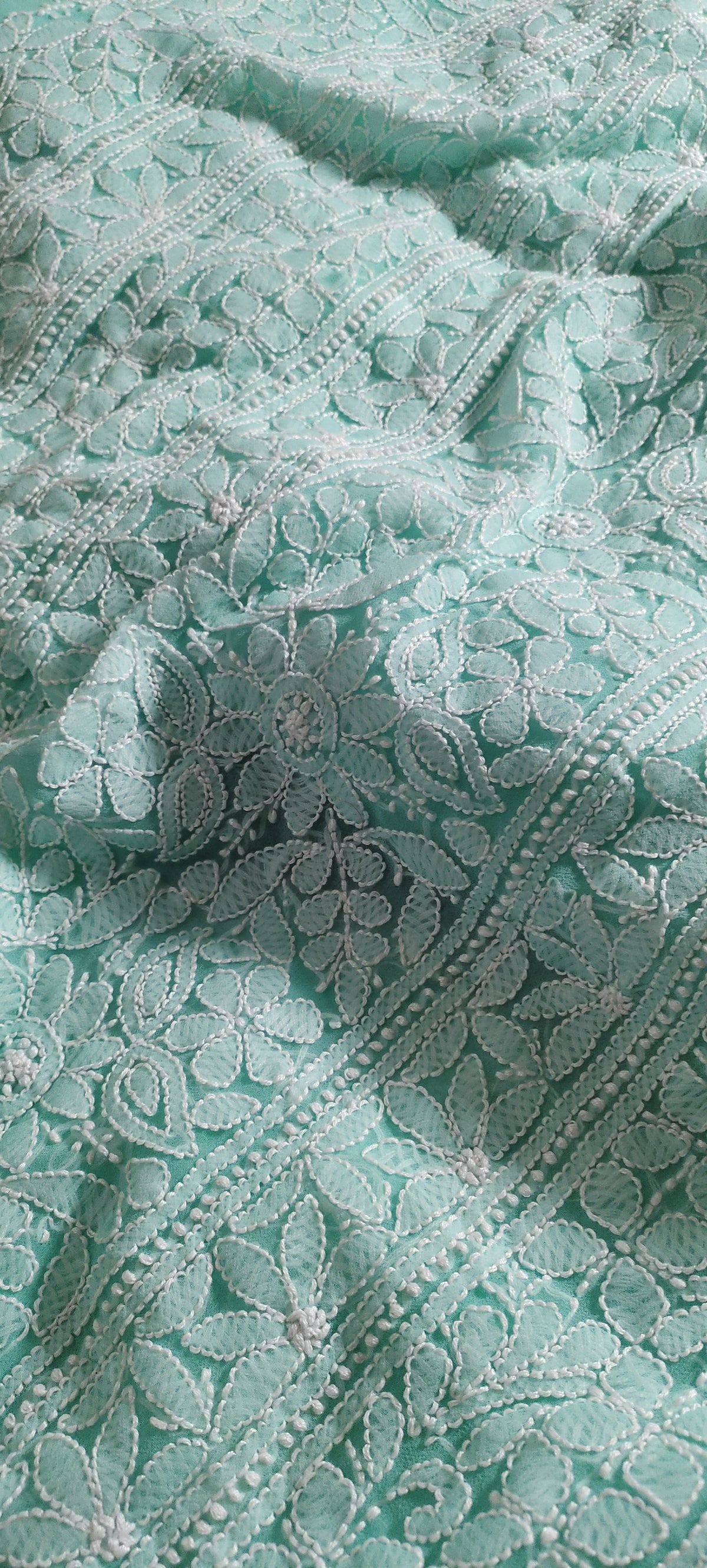 Beautiful handcrafted Lucknow Chikankari full suit in faux Georgette by LVW Fashions, featuring intricate embroidered kurta and matching dupatta.