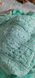 Beautiful handmade faux georgette Chikankari full suit by LVW Fashions featuring intricate Lucknow-style embroidery.