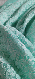 Beautiful handcrafted Chikankari full suit in faux Georgette, featuring intricate Lucknow-style embroidery by LVW Fashions.