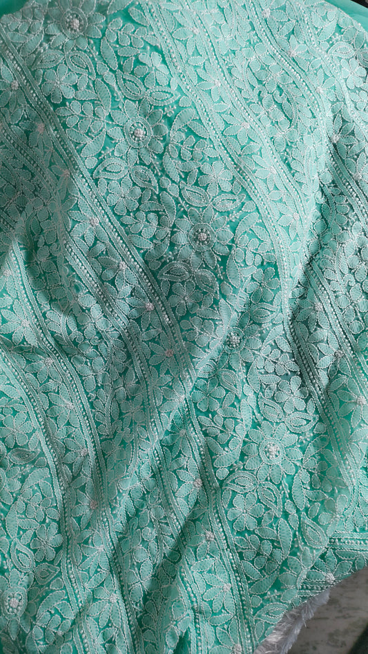 Beautiful handcrafted Chikankari full suit in faux Georgette by LVW Fashions, featuring intricate Lucknow embroidery and traditional craftsmanship.