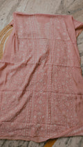 Handmade Lucknow Chikankari Kurta by LVW Fashions featuring intricate white embroidery on soft fabric.