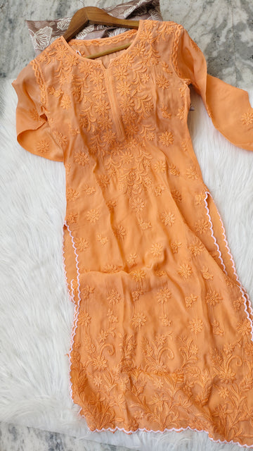 Handmade Lucknow Chikankari kurta by LVW Fashions, featuring intricate white embroidery and traditional craftsmanship.