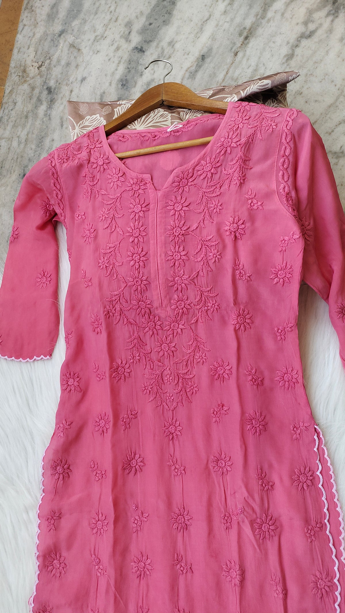 Handmade Lucknow Chikankari kurta by LVW Fashions featuring intricate embroidery and traditional craftsmanship.