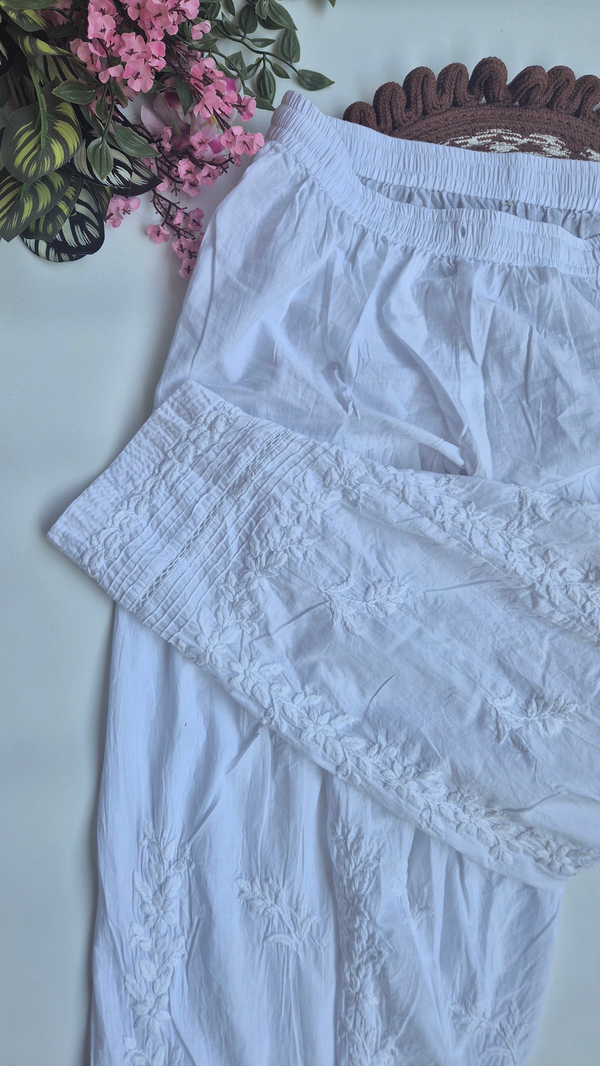 Premium cotton Chikankari shalwar from LVW Fashions featuring intricate handmade Lucknow Chikankari embroidery.