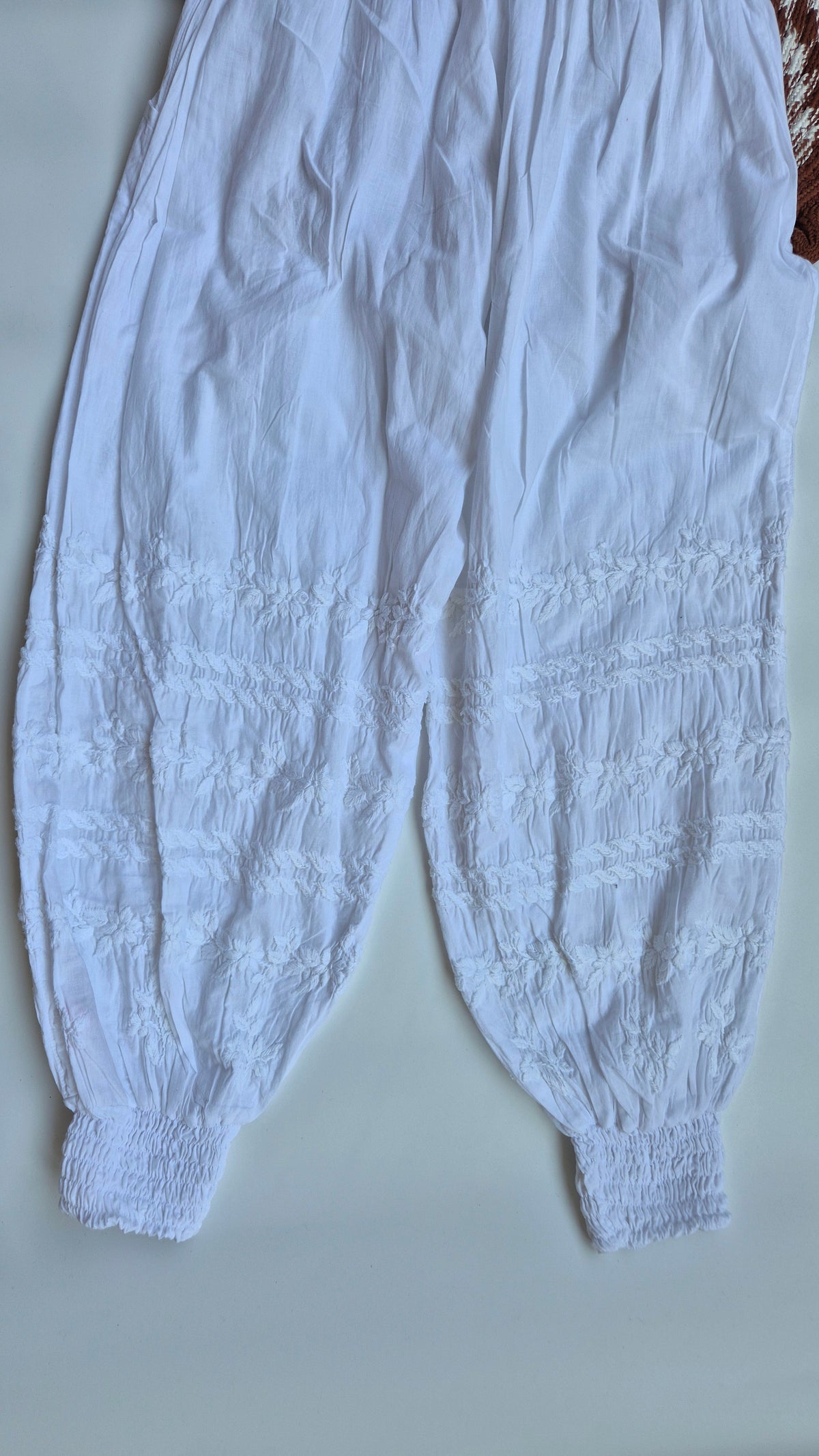 Premium cotton Chikankari bottom with elastic waist, handmade in Lucknow, from LVW Fashions, featuring intricate embroidery.