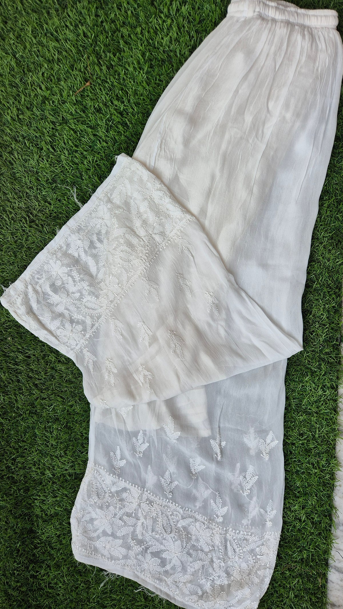 Resham embroidery premium georgette palazzos with inner attached, dyeable fabric, from LVW Fashions, featuring handmade Chikankari design.