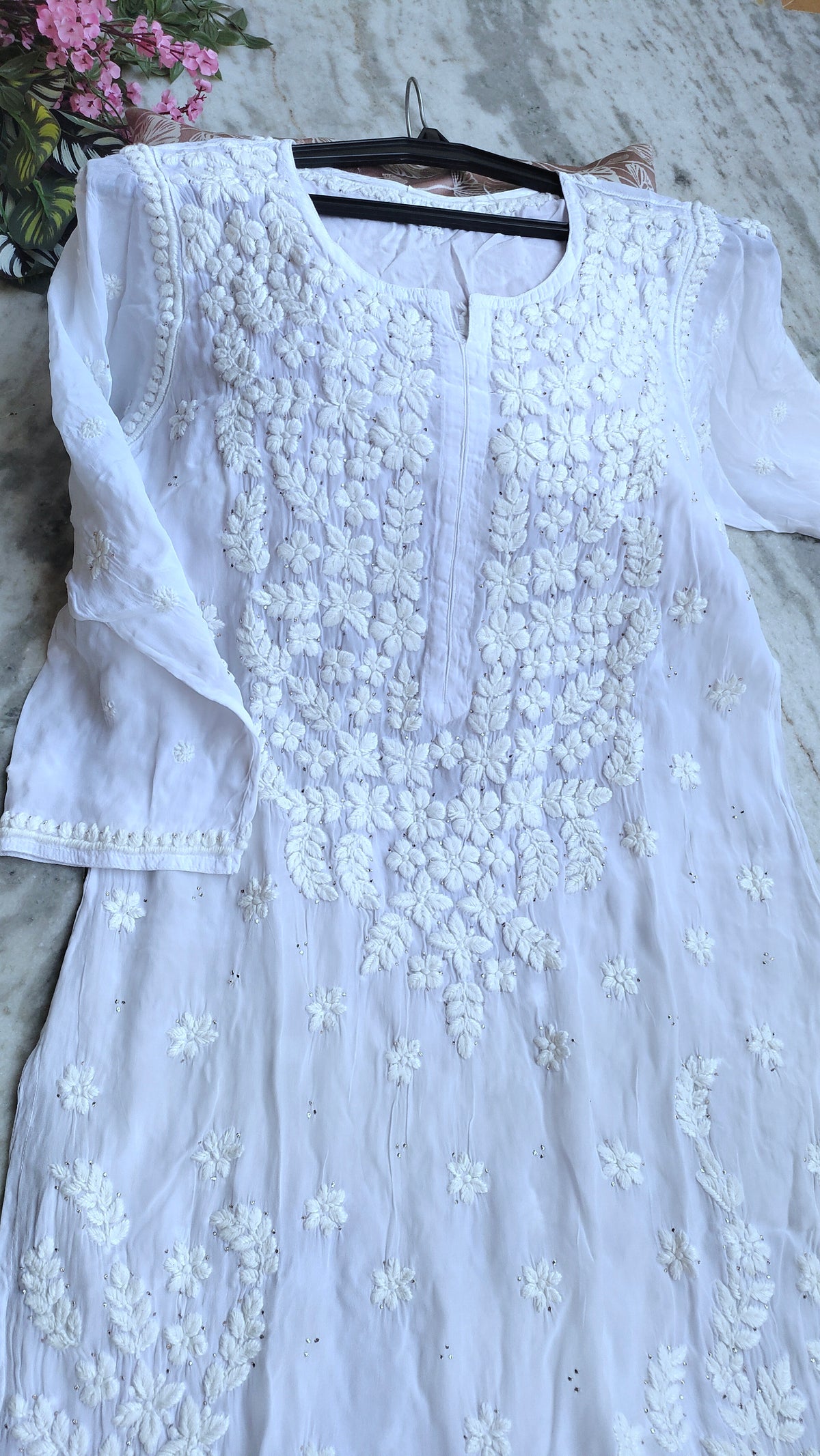 Handmade LVW Fashions Lucknow Chikankari Kurta with intricate embroidery, showcasing traditional Indian craftsmanship.