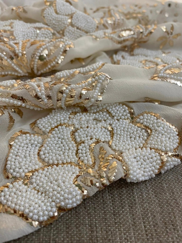 Ivory handmade Georgette Chikankari unstitched suit with Pitta Kamdani and pearl embroidery by LVW Fashions, Lucknow Chikankari style.
