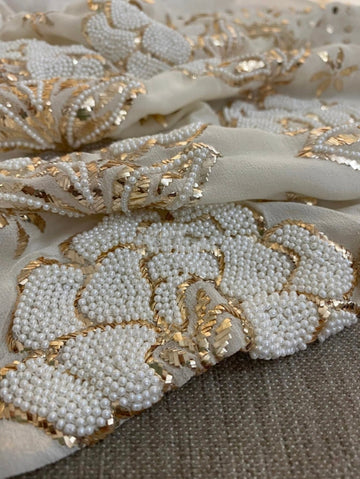 Ivory handmade Georgette Chikankari unstitched suit with Pitta Kamdani and pearl embroidery by LVW Fashions, Lucknow Chikankari style.
