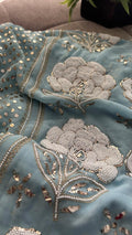 Ivory handmade Georgette Chikankari unstitched suit with pitta Kamdani and pearl embroidery, crafted by LVW Fashions from Lucknow Chikankari.