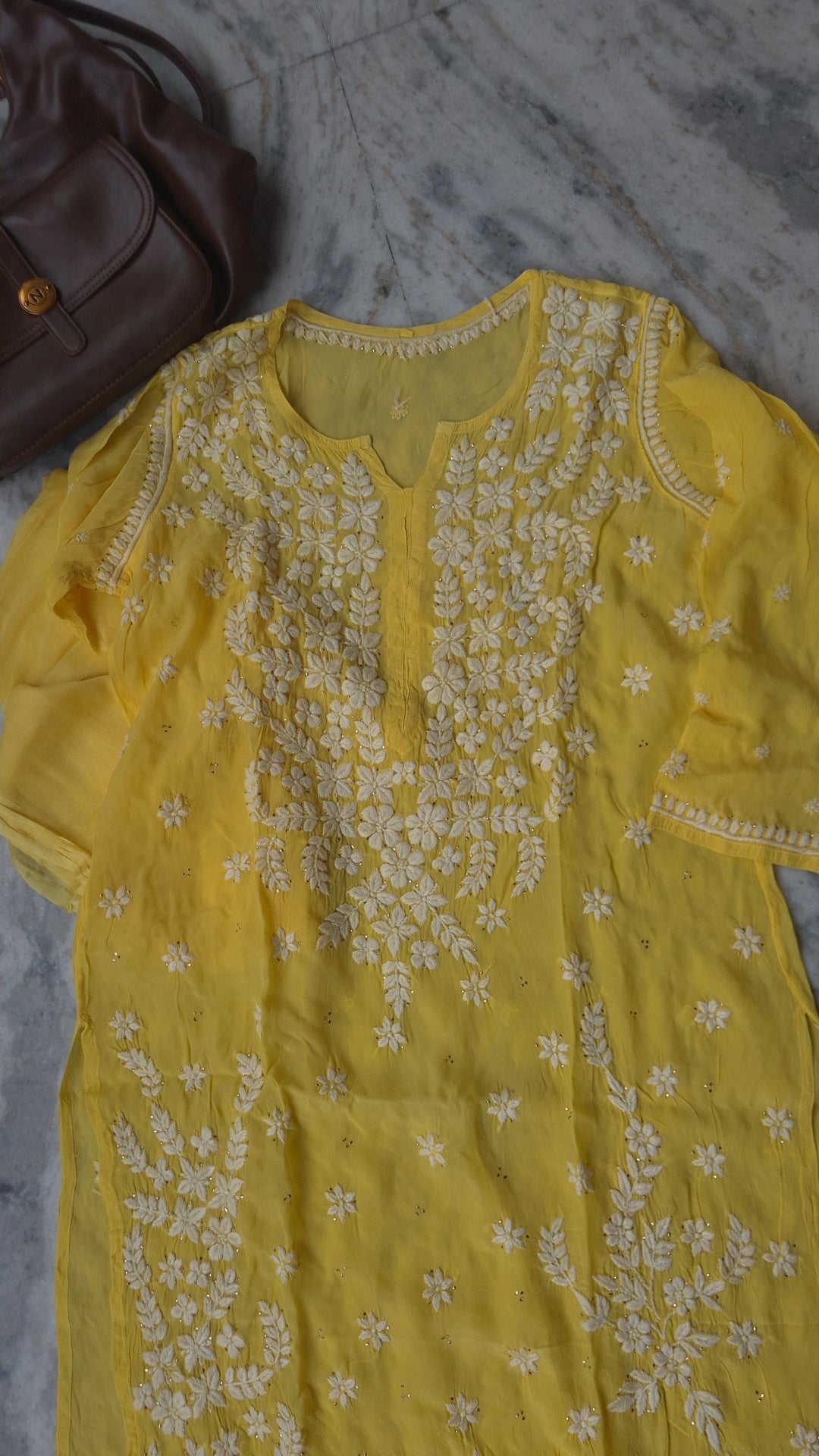 Handmade LVW Fashions Lucknow Chikankari kurta set with unique plazzo design, premium georgette fabric, and luxurious embellishments.