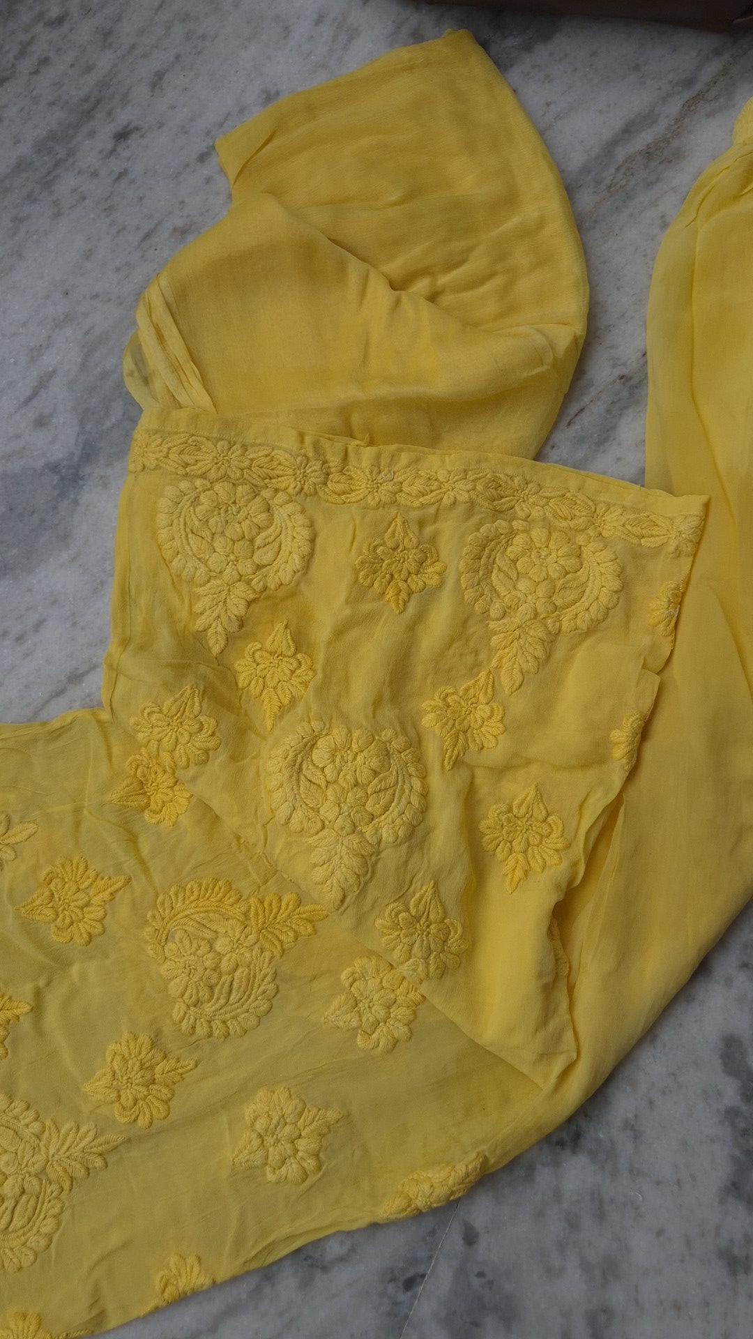 Handmade LVW Fashions Lucknow Chikankari kurta set with unique plazzo design, premium georgette fabric, and luxurious Kamdani accents.