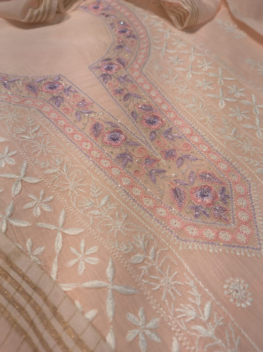 Handmade peach Noori Parsi Chikankari Kurta with Mul Chanderi fabric, unstitched suit with matching dupatta from LVW Fashions.