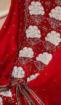Red premium Georgette Chikankari unstitched suit with Pitta Kamdani and pearl embroidery, handcrafted by LVW Fashions from Lucknow.