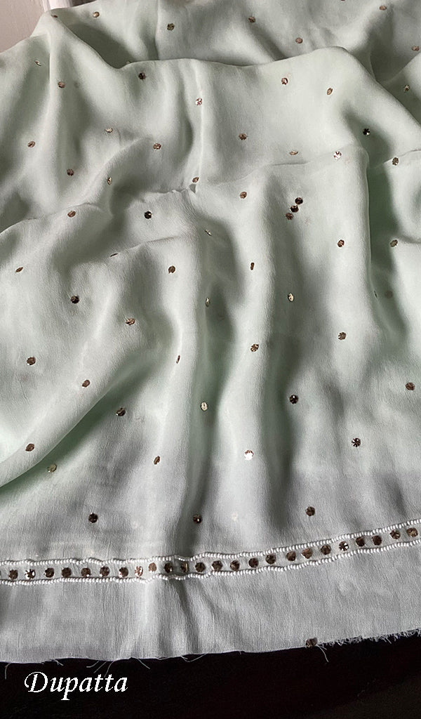 Handmade red Georgette Chikankari unstitched suit by LVW Fashions with Pitta Kamdani and pearl embroidery, traditional Lucknow Chikankari style.