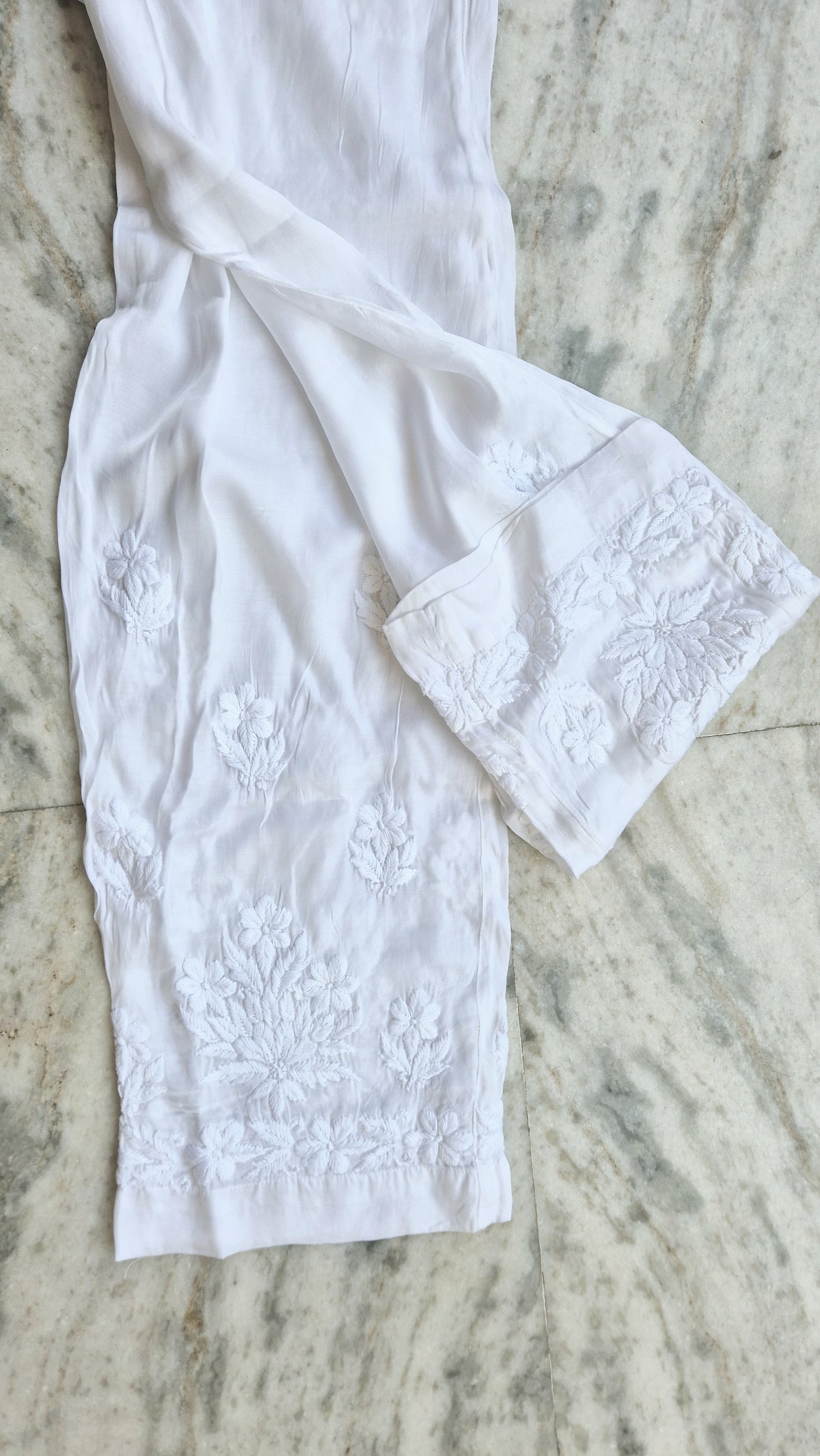 Handmade Lucknow chikankari kurta with lace, paired with premium soft cotton and silk bottoms by LVW Fashions.