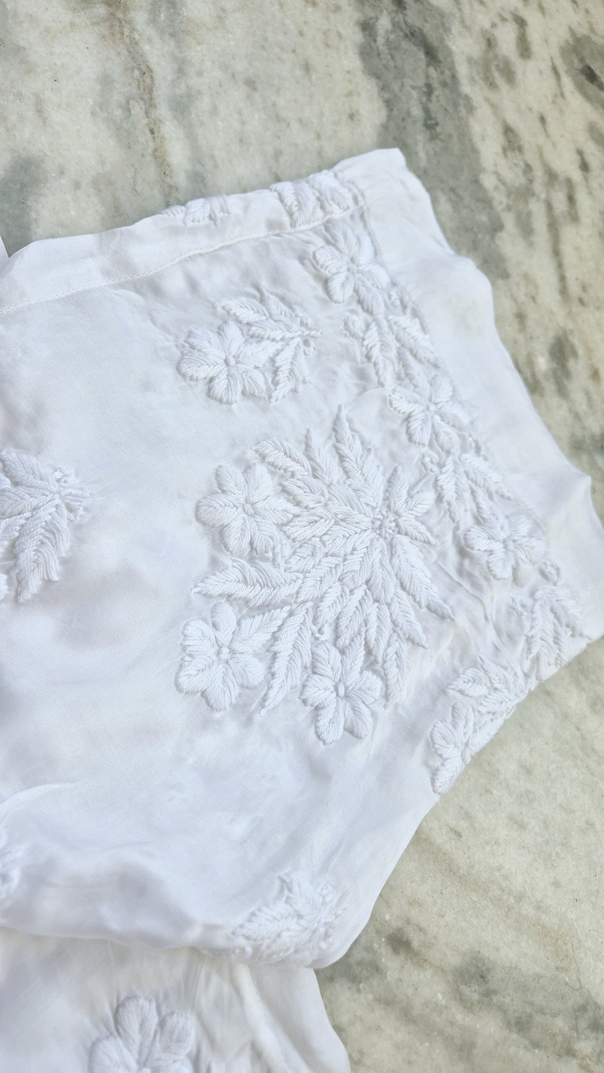 Handmade chikankari kurta with lace, paired with premium soft cotton and silk bottoms, showcasing traditional Lucknow craftsmanship.