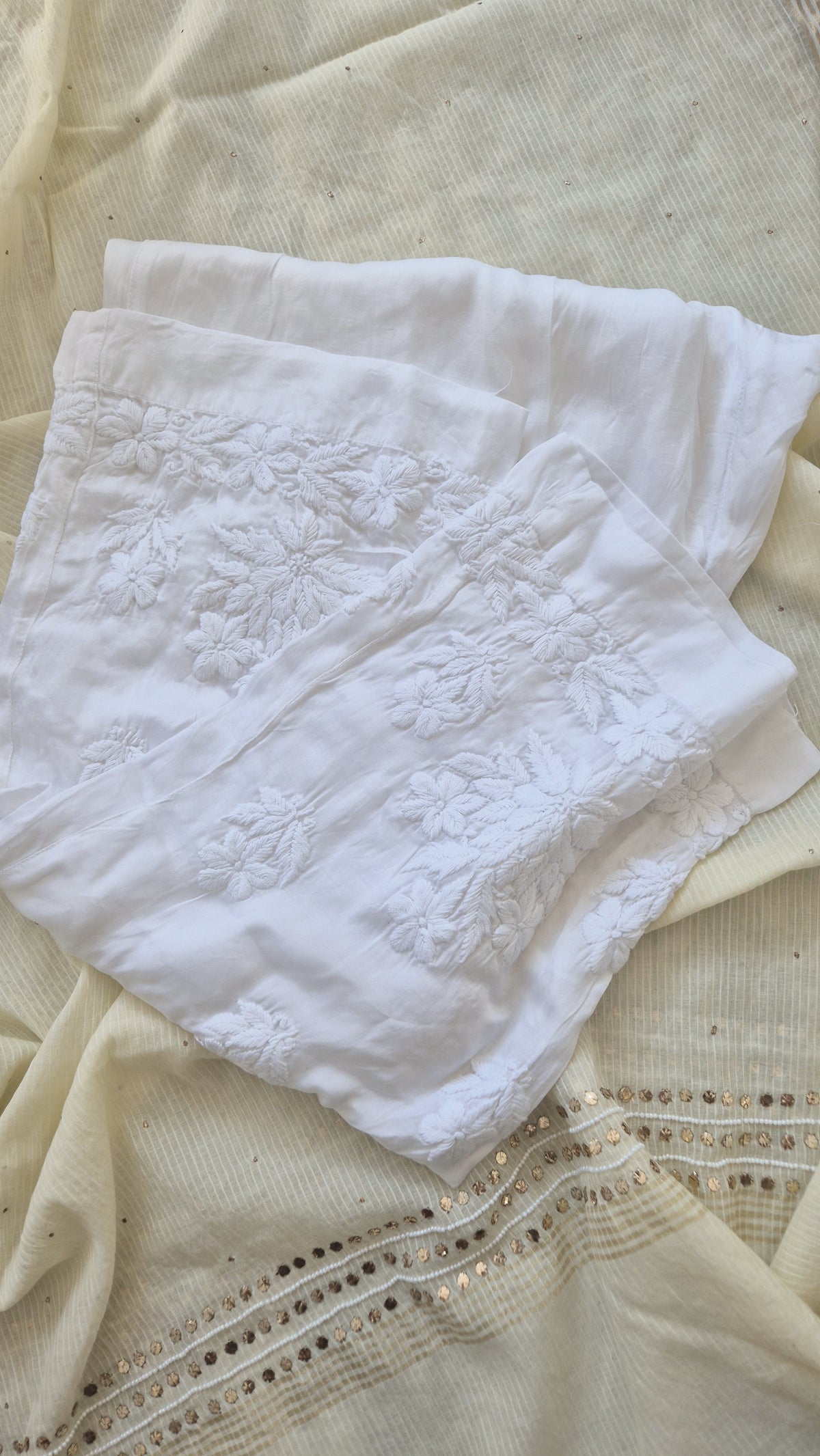 Handmade Lucknow chikankari kurta with lace, paired with pure soft cotton and silk bottoms by LVW Fashions.