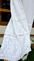 Handmade Lucknow chikankari kurta with lace, paired with premium soft cotton and silk bottoms, showcasing intricate embroidery details.