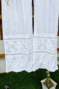 Handmade chikankari kurta with lace, paired with premium pure soft cotton and silk bottoms, crafted by LVW Fashions.