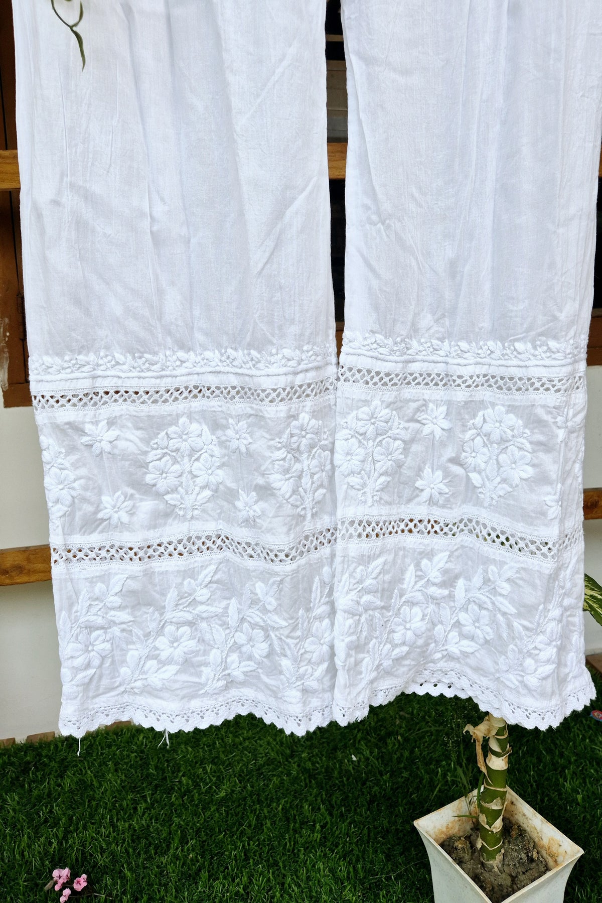 Handmade chikankari kurta with lace, paired with premium pure soft cotton and silk bottoms, crafted by LVW Fashions.