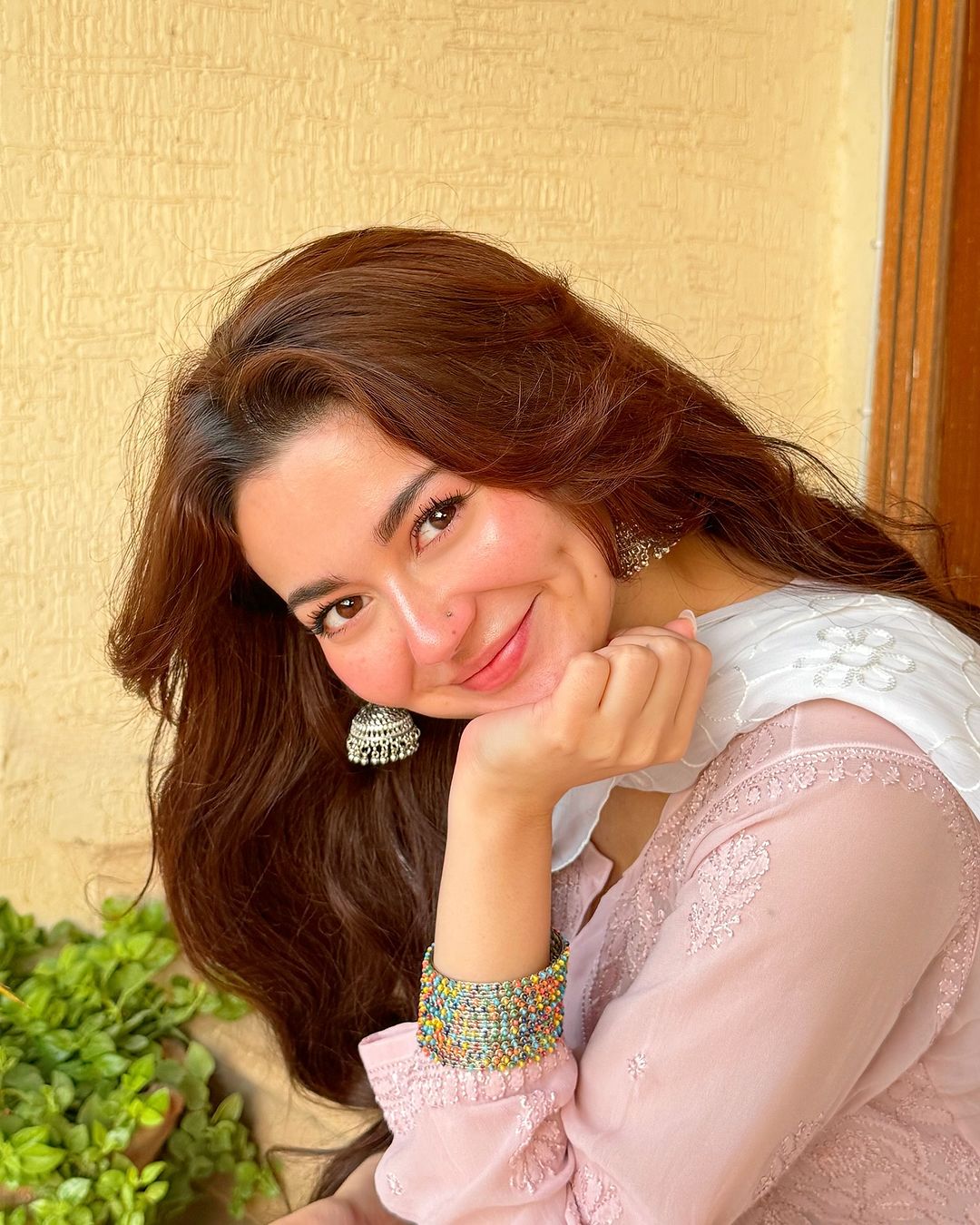 Blush pink and white georgette Chikankari Kurti set by LVW Fashions, featuring intricate handmade Lucknow embroidery.