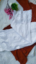 Beautiful handmade Lucknow Chikankari georgette kurta with silk plazzos co-ord set by LVW Fashions, featuring intricate embroidery.