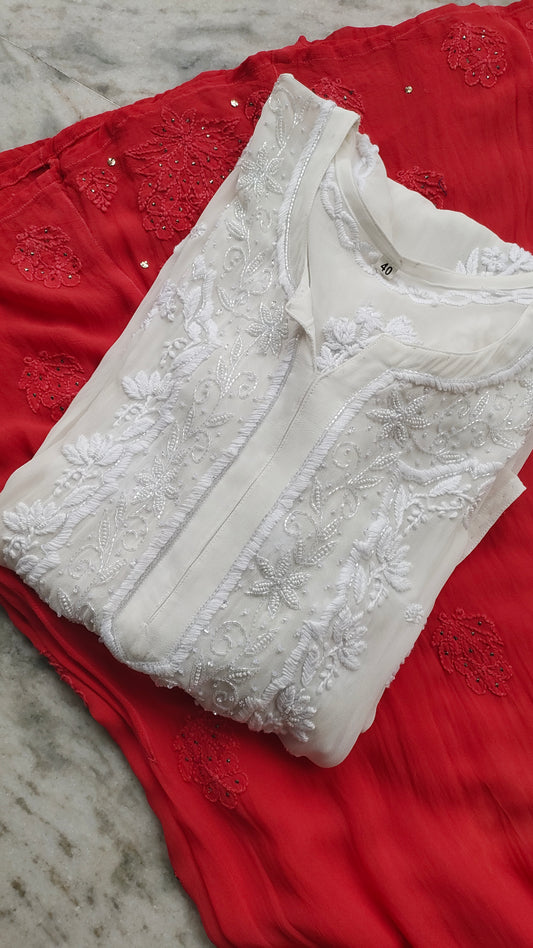 Noori white and red co-ord sharara set by LVW Fashions featuring handmade Lucknow Chikankari kurta with intricate embroidery.