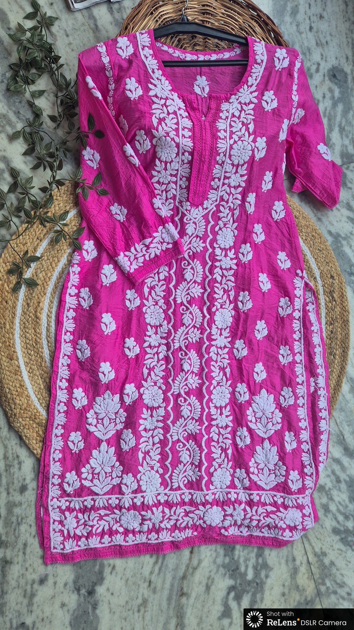 A woman wearing the LVW Fashions Adaya premium cotton silk luxurious Chikankari co-ord set with intricate handmade Lucknow Chikankari.