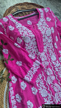 Awoman wearing the LVW Fashions Adaya premium cotton silk luxurious Chikankari co-ord set with intricate handmade Lucknow Chikankari embroidery.