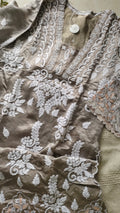 Huma Silver Silk handcrafted designer co-ord set with Lucknow Chikankari and golden Gota work, featuring a matching kurta and pants.