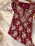 Deep maroon Azhel co-ord set by LVW Fashions with intricate back and sleeve embroidery in handmade Lucknow Chikankari style.