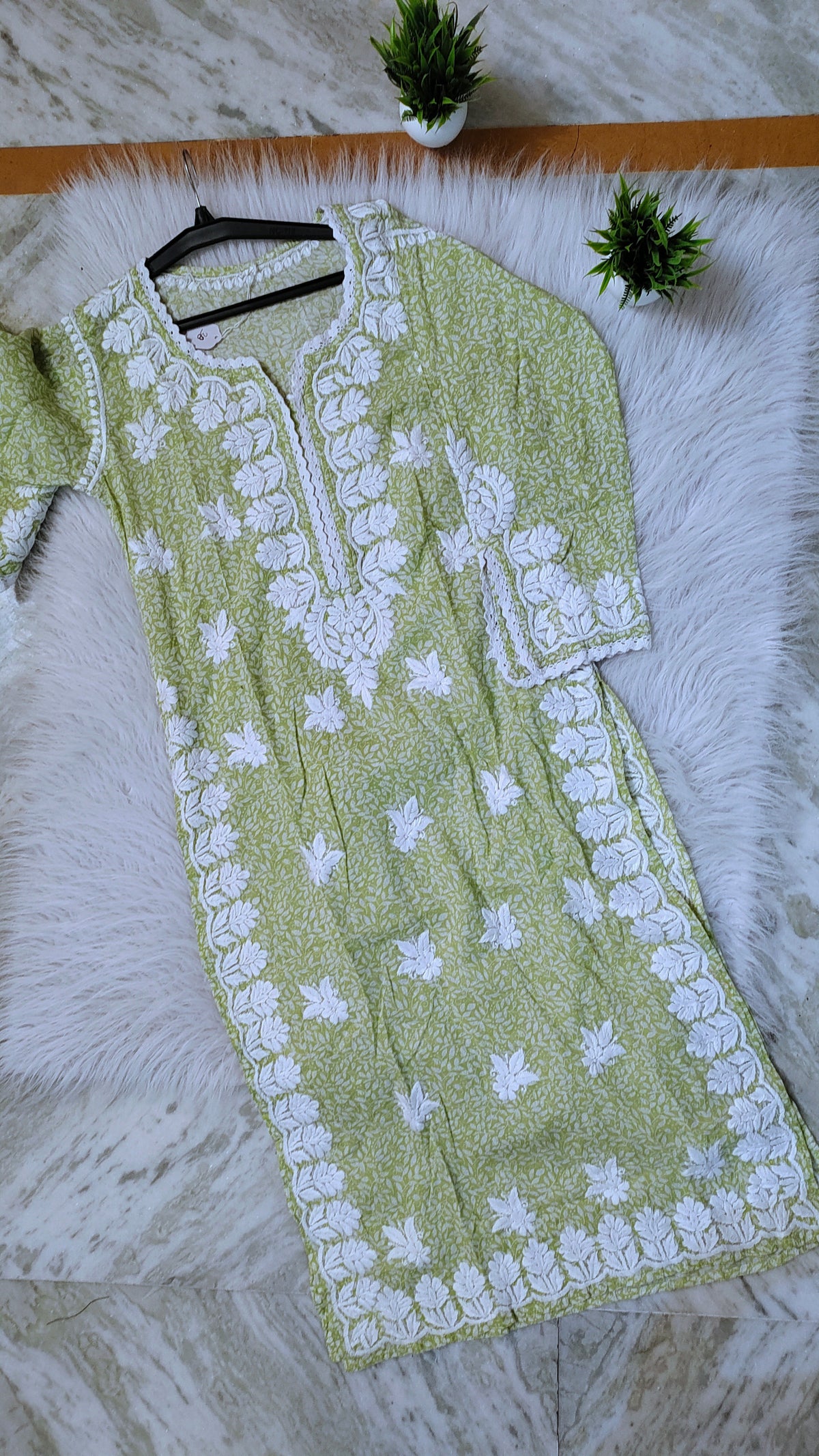 Green wrist-cut premium mul soft cotton kurti by LVW Fashions featuring handmade Lucknow Chikankari embroidery.
