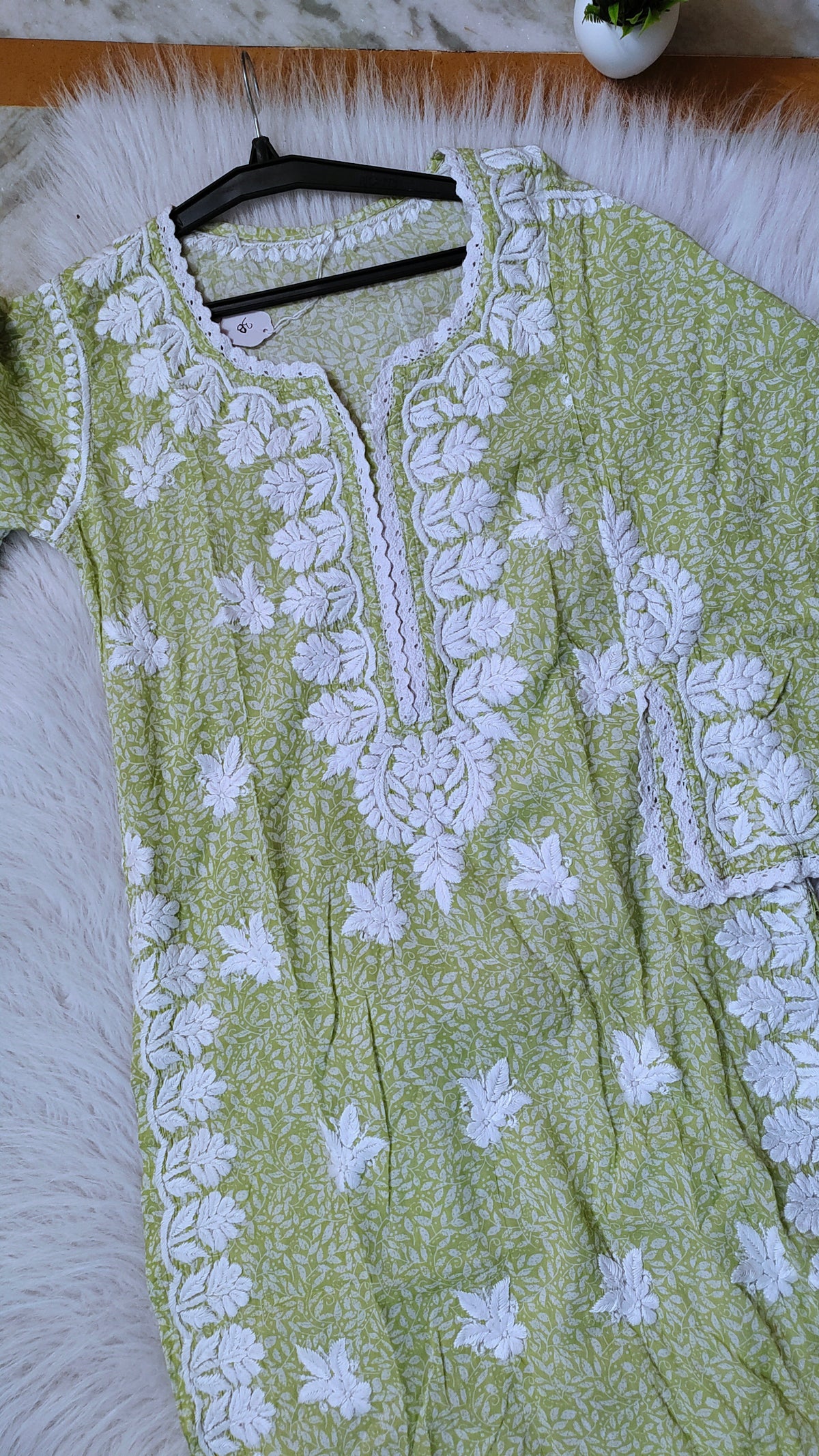 Green wrist cut premium Mul soft cotton kurti by LVW Fashions featuring handmade Lucknow Chikankari embroidery.
