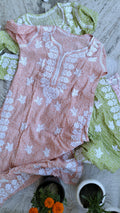 Green wrist cut premium mul soft cotton kurti with intricate handmade Lucknow chikankari by LVW Fashions.