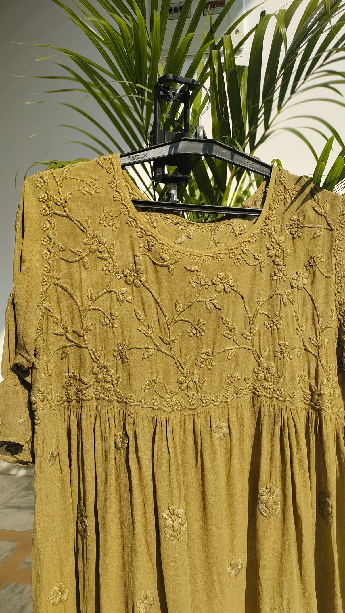 Handmade green Gazal Premium Georgette Tunic with intricate Lucknow Chikankari embroidery on both sides, by LVW Fashions.