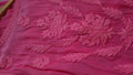 Beautiful fuchsia pink premium silk A-line dress by LVW Fashions featuring luxurious handmade Chikankari embroidery.