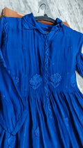 Green silk handmade midi shirt dress with intricate Lucknow Chikankari embroidery by LVW Fashions, crafted in pure silk.