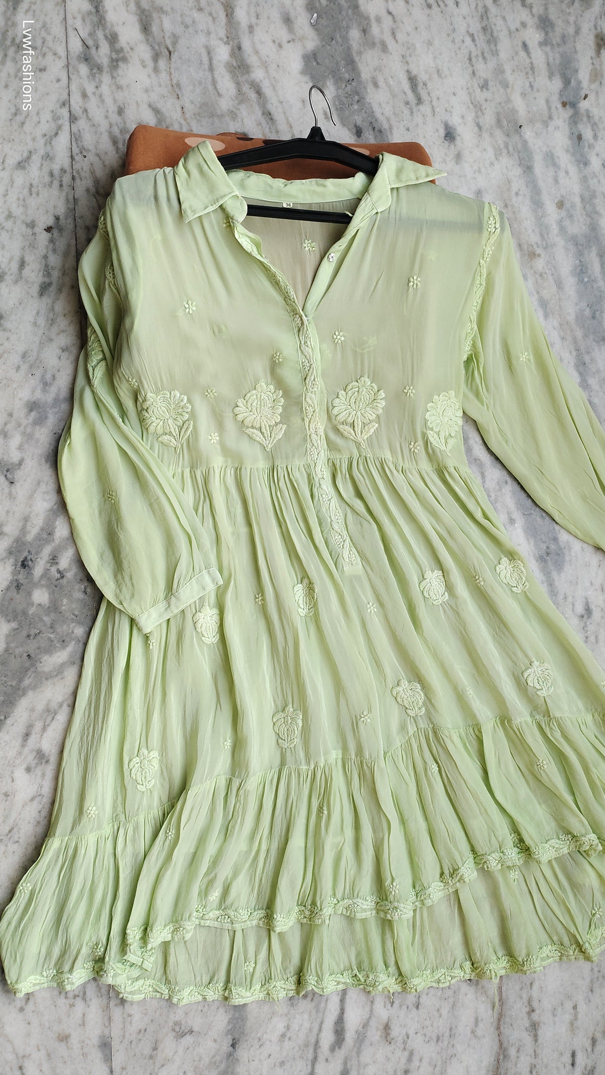Pure handcrafted Chikankari silk midi shirt dress by LVW Fashions, featuring traditional Lucknow embroidery in a soft pistachio color.