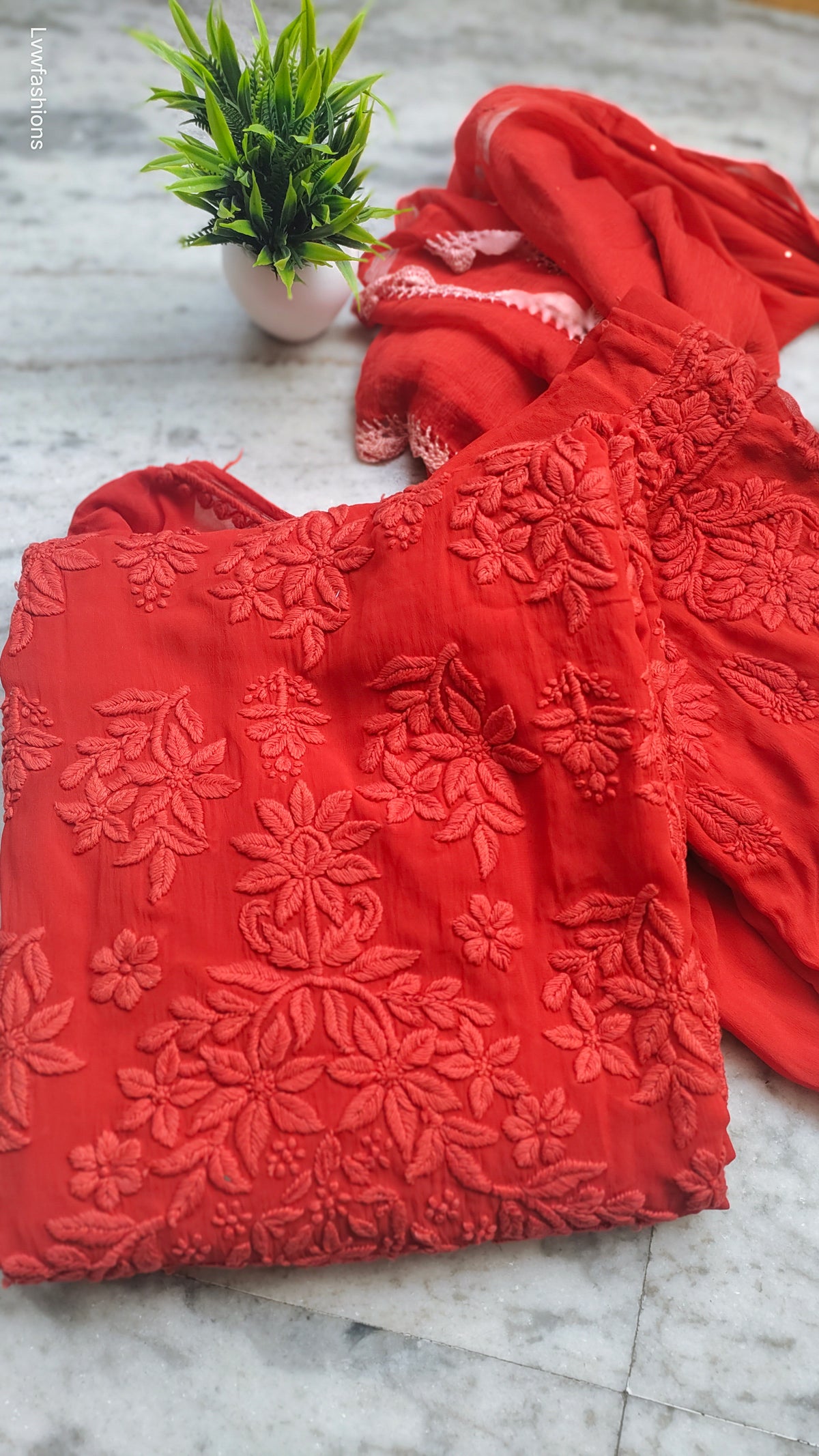 Adaya Chilly Red silk Chikankari Kurta set by LVW Fashions featuring intricate handmade Lucknow Chikankari embroidery.