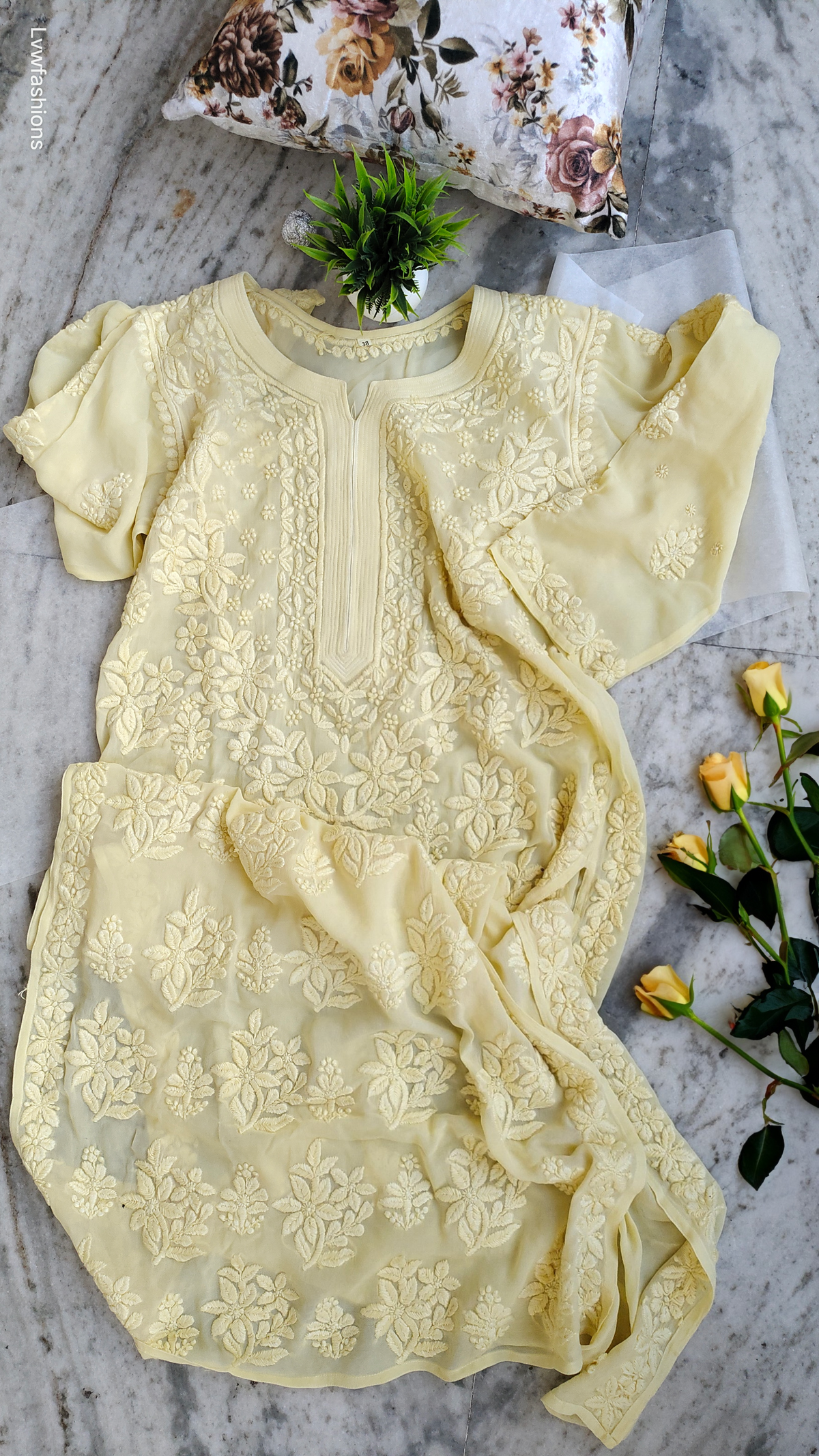 Aptly crafted lemon pastel yellow Georgette Kurta with intricate Lucknow Chikankari embroidery by LVW Fashions.
