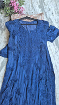 Handcrafted metallic blue long kurta with chikankari embroidery, pockets, from LVW Fashions, showcasing traditional Lucknow craftsmanship.
