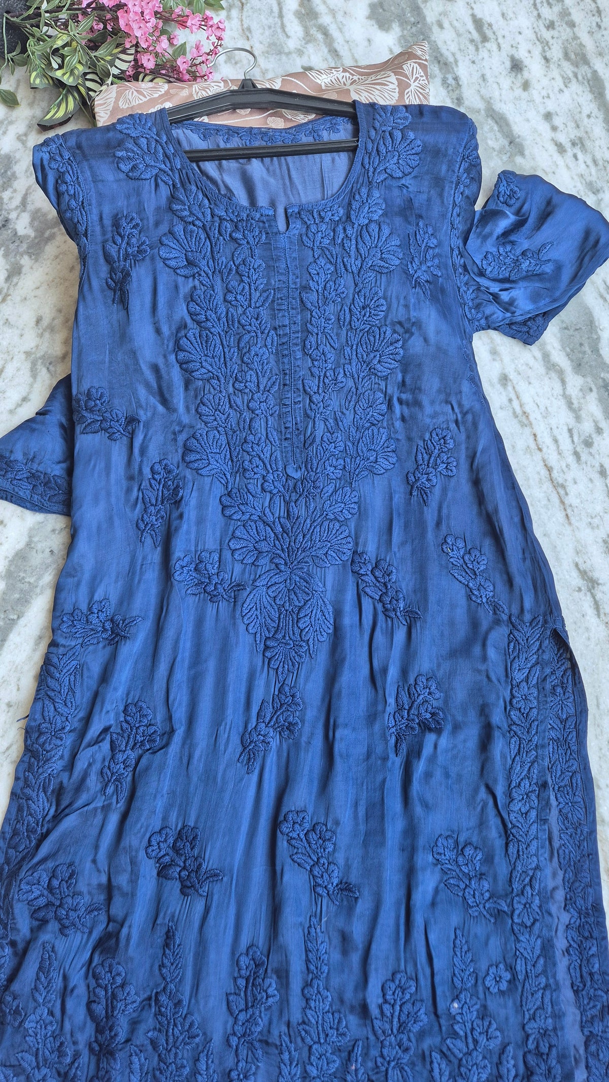 Luxurious blue handcrafted Chikankari long kurta with pockets from LVW Fashions, featuring intricate metallic embroidery and elegant design.