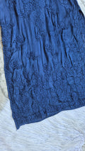 Luxurious metallic blue handcrafted Chikankari long kurta with pockets, from LVW Fashions, showcasing intricate Lucknow embroidery.
